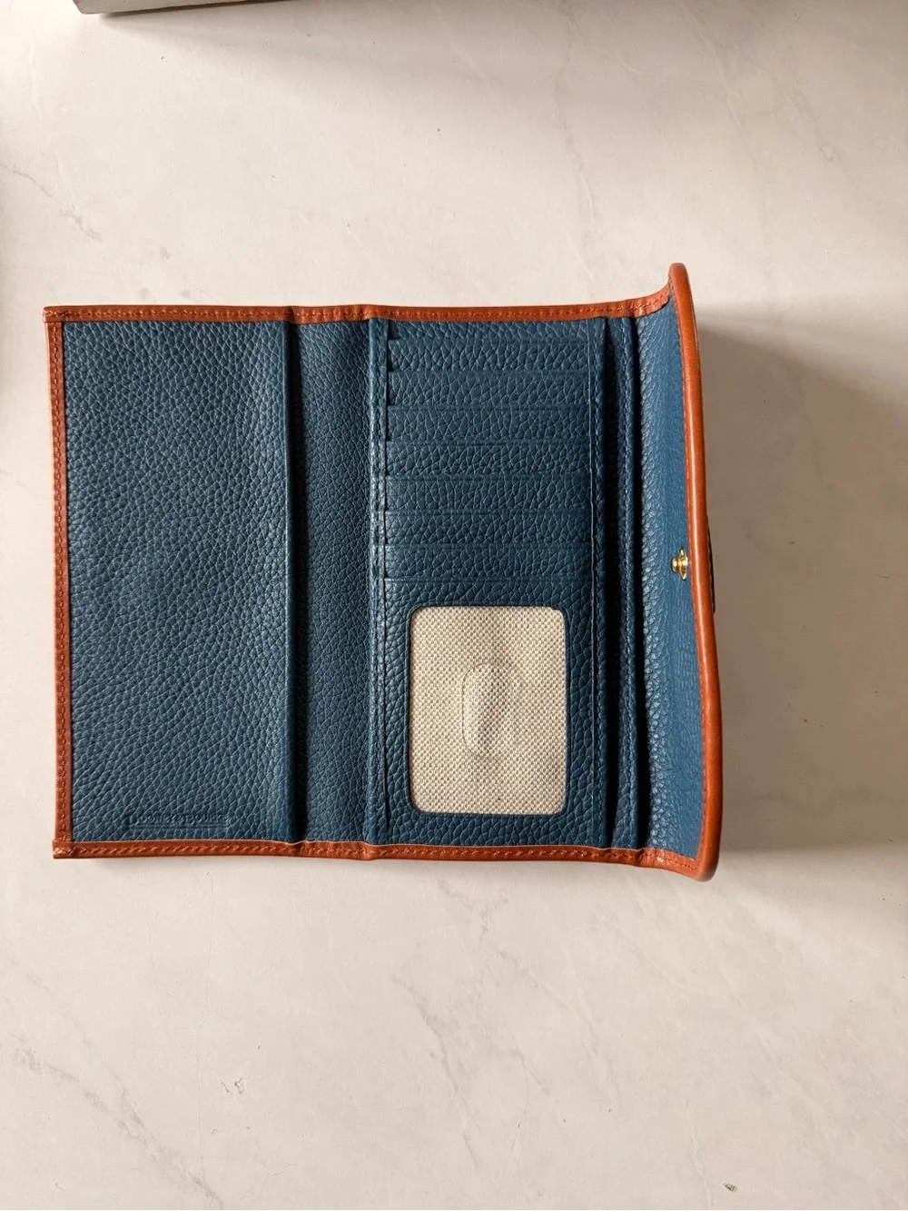 Dooney & Bourke Navy Pebbled Leather Wallet with Brown Trim - Picture 3 of 4